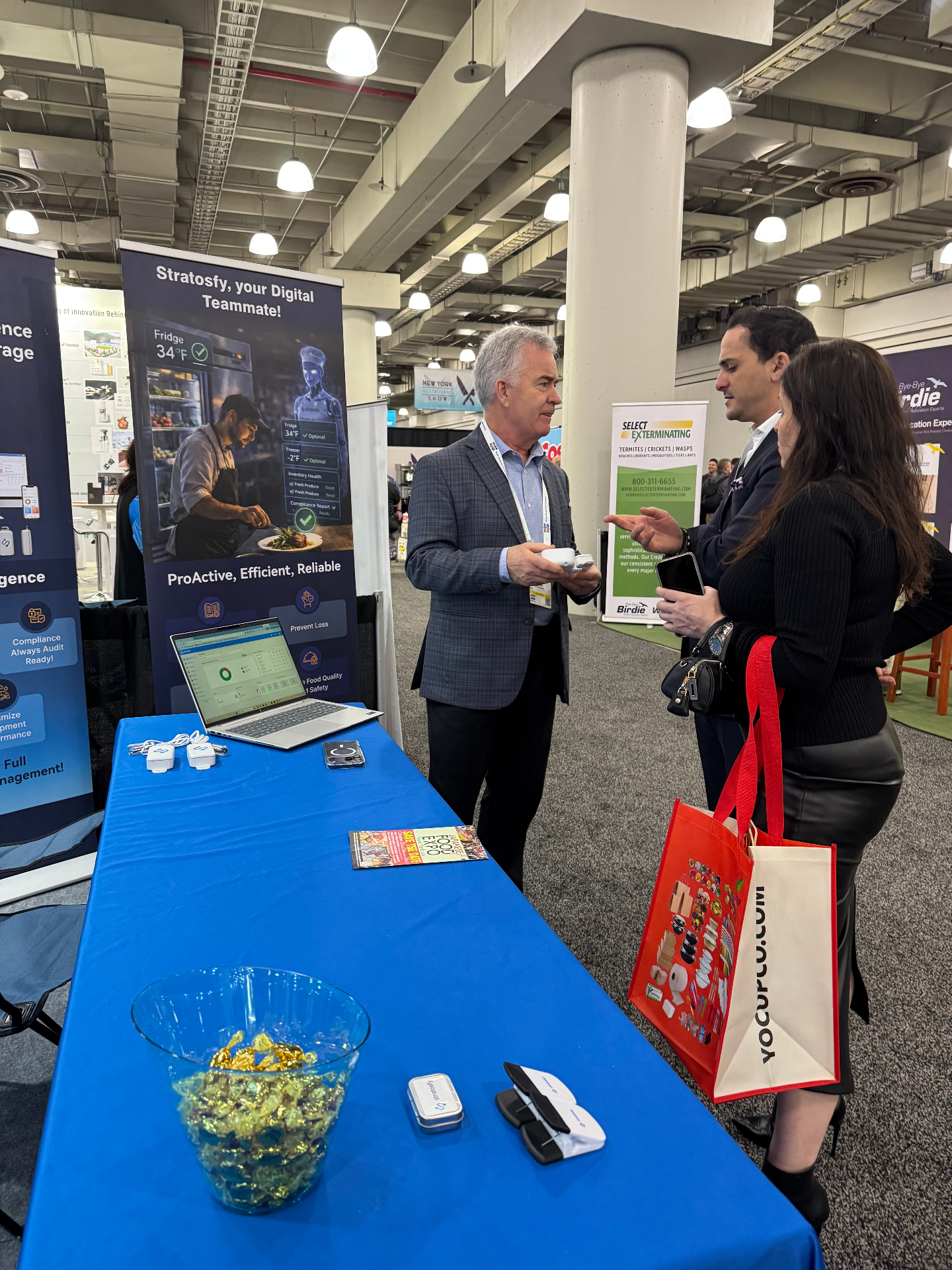 Greg Maloney in conversation with a customer at the Stratosfy booth